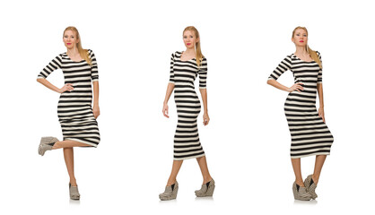 Fototapeta premium Young woman in long striped dress isolated on white