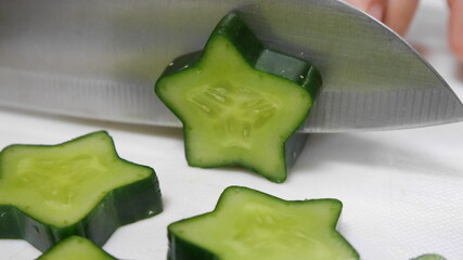 Cutting star shaped fun cucumber slices