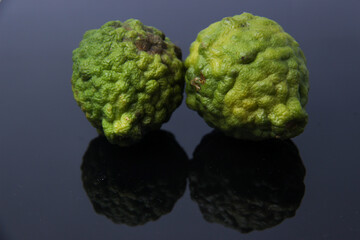 kaffir lime is a fruit that is used as a spice in the kitchen or food flavoring