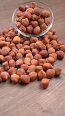 Black Chickpeas or Kala Chana with chana dal pulse isolated on wooden Background.