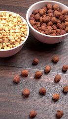Black Chickpeas or Kala Chana with chana dal pulse isolated on wooden Background.