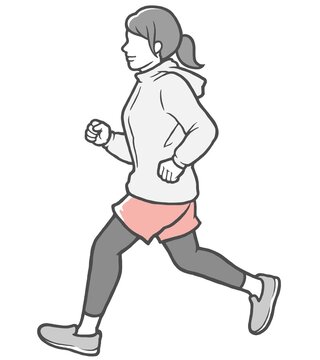 パーカーを着てジョギングする横向きの若い女性
