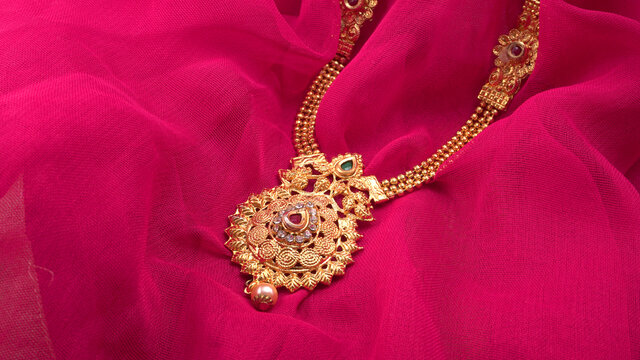 Indian Traditional gold Jewellery on beautiful background.
