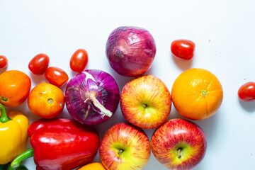 Fresh colorful fruits and vegetables isolated on white background.