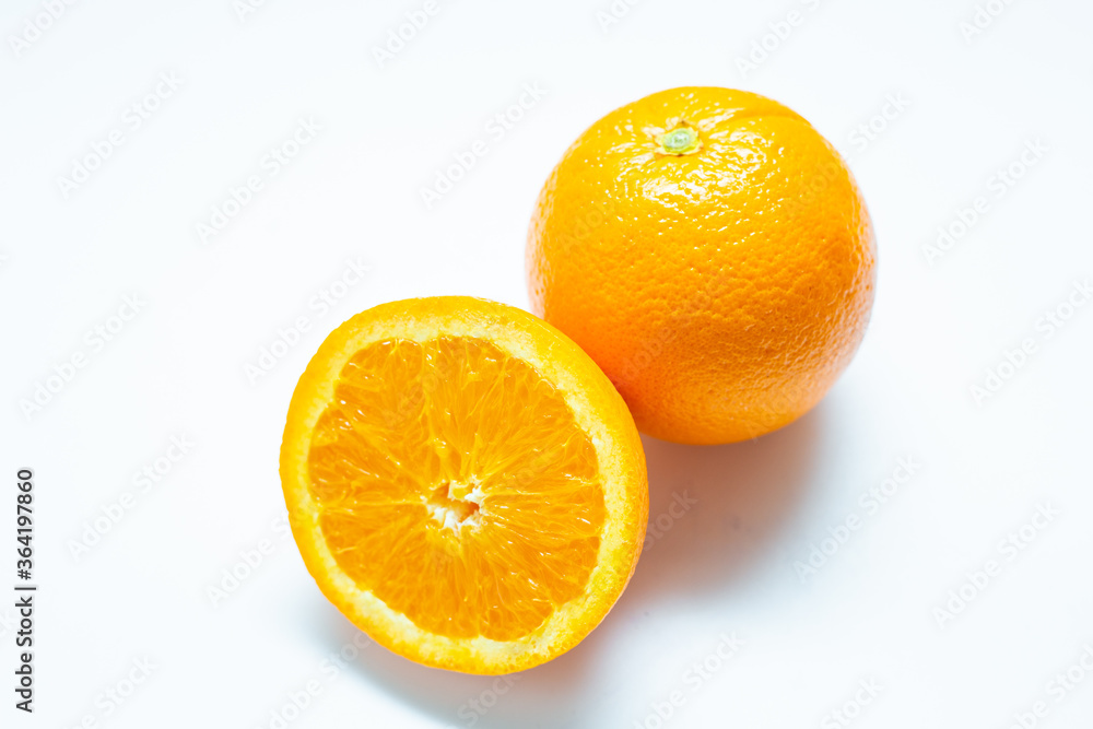 Wall mural sliced fresh orange fruit on white background