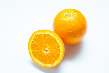 Sliced fresh orange fruit on white background