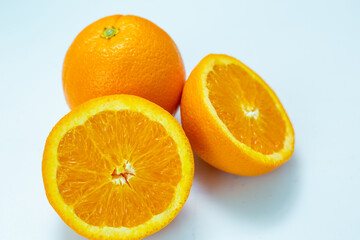 Sliced fresh orange fruit on white background