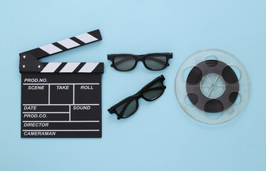 Movie clapper, film reel and 3D glasses on blue background. Entertainment industry. Cinema. Top view