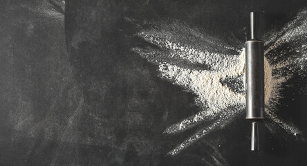 Explosion of flour under a metal rolling pin