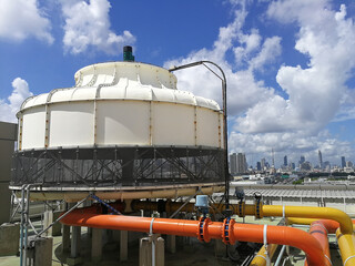 Counter Flow type Cooling tower with city view and blue sky - HVAC