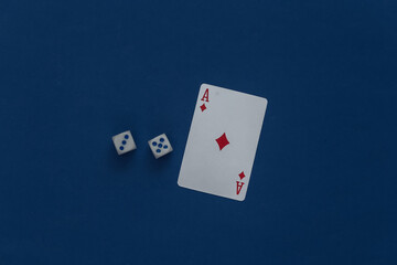 Ace of tambourine and dice on a classic blue background.