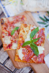 Slices of pizza with basil