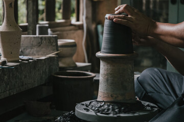 Artisan potter making art pot handicraft