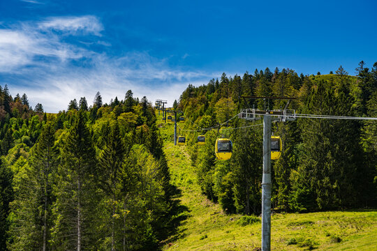 Beautiful view from the Mountain (Belchen) near Freiburg on the beautiful landscape of the Black Forest and the (Belchenbahn) ropeway.