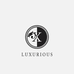 Circle X Letter Logo Icon. Classy Vintage Ornate Leaf Shape design on black and white color for business initial like fashion, jewelry, beauty salon, cosmetics, spa, hotel and restaurant