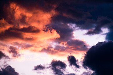 clouds in the sky while the golden hour