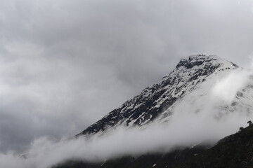 Snow and mist covered mountain