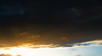 clouds in the sky while the golden hour