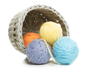 Basket with threads isolated on white background