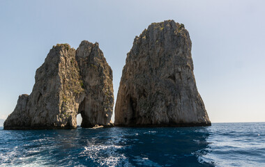 The majestic faraglioni of the island of Capri, Campania, Naples.
