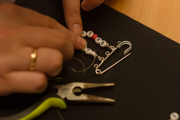Creating handmade jewelry.