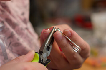 Creating handmade jewelry.