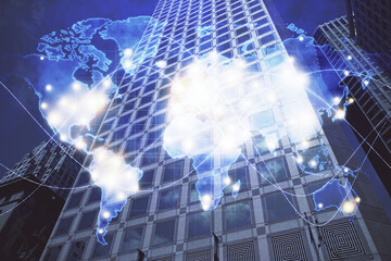 Double exposure of business theme hologram drawing and city veiw background. Concept of success.