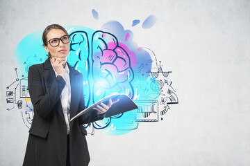 Woman in glasses with notebook, business idea