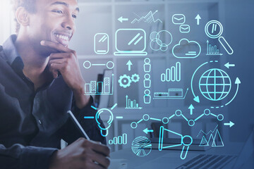 Smiling African man in office, business sketch