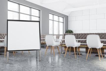 White and grey cafe corner with square poster