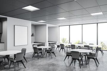 Panoramic white cafe corner with sofas and poster