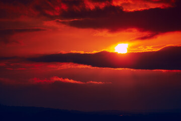Dramatic sky in the twilight . Majestic mystical sunset