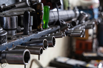 Close up A lot of socket wrench and tools at mechanic shop.