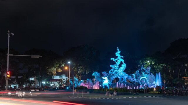 Bali, Indonesia - Satria Gatotkaca Horse Statue at Night Kuta Tuban near Ngurah Rai Airport Traffic Time Lapse