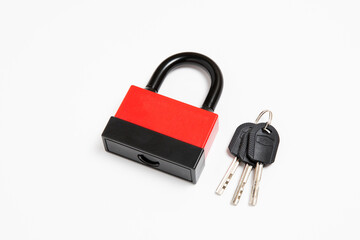 The alarm siren padlock with key isolated on white background.High-resolution photo.