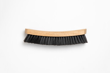 Clothes brush isolated on white background. High-resolution photo.