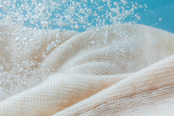 close up of washing cloth in water.