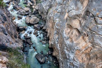 El Caminito del Rey in El Chorro gorge, Spain, view from above of the deep precipice with wild...