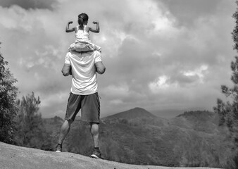 People standing on top of a mountain hike. Goals and achievement.