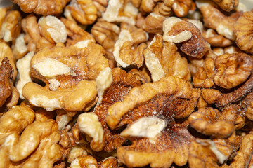 Peeled walnuts close-up. Surface texture. Healthy diet.