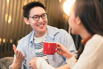 Happiness asian couple laugh smile together with in kitchen pantry humor emotional casual relax...