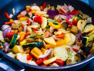 Paella chicken on wooden background
