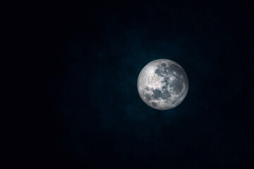 Abstract image of Full moon in cloudy day. (Elements of this image furnished by NASA.)