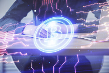 Man's hands working with notes background. Cryptocurrency and finance concept.