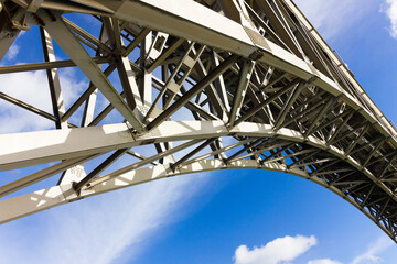 Iconic steel curve of Britannia Bridge a Grade II Listed structure, Isle of Anglesey, North Wales 