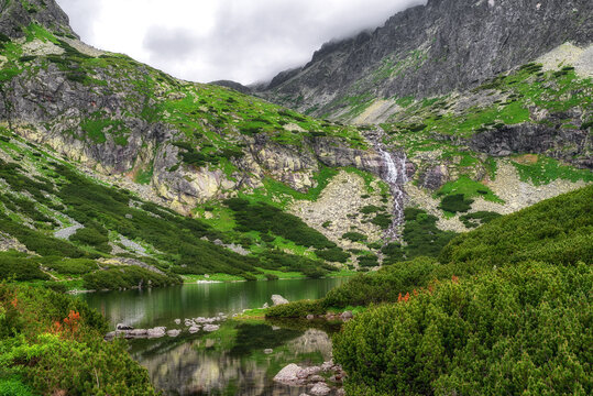Tarn Velicke pleso and Velicky waterfall in High Tatras mountains, Slovakia