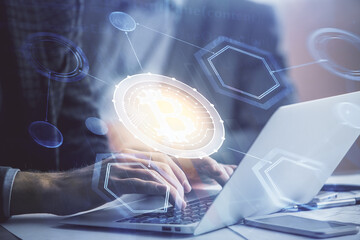 Blockchain theme hud with man working on computer on background. Concept of crypto chain. Double...