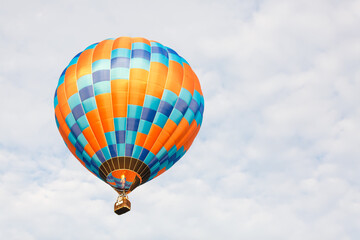 hot air balloon over blue sky. Composition of nature and blue sky background