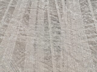 Tire marks on the road surface.