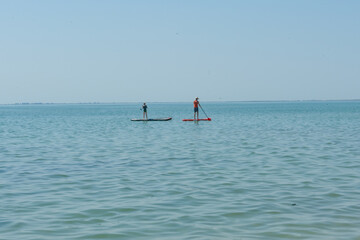 Kayaking. People are floating on a sea kayak. Adventure on the water.